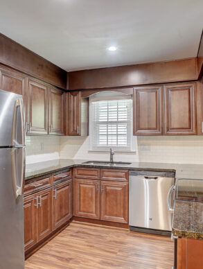 Strawberry Hill kitchen with wood cabinets and stainless steel appliances
