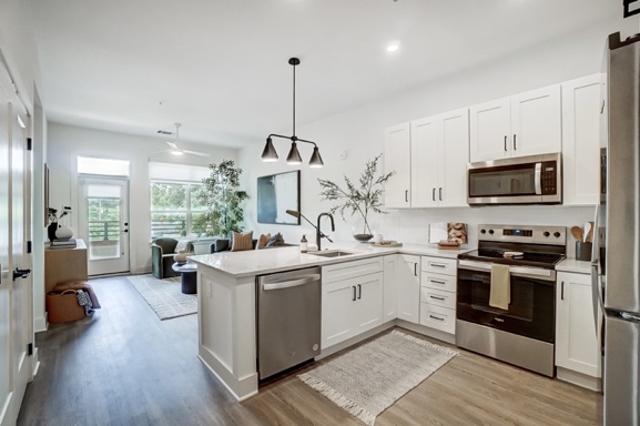 Bright, airy kitchen and living room area