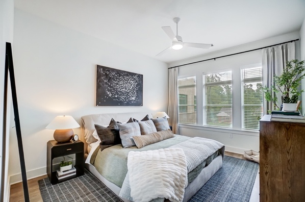 Cozy bedroom in a Marsh Properties rental unit.