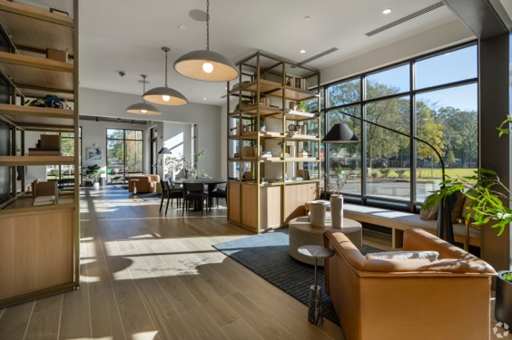 Community area with tables and comfortable seating